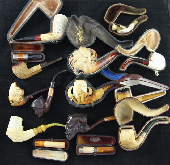 A collection of meerschaum pipes and cheroot holders